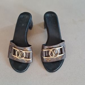 Louis vuitton  lock it Mules sz 8